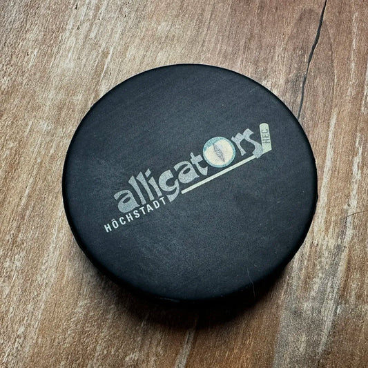 Puck mit Logo der Höchstadt Alligators